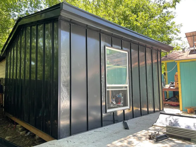 Black standing seam metal wall panels for Roof Inspection in Urbana